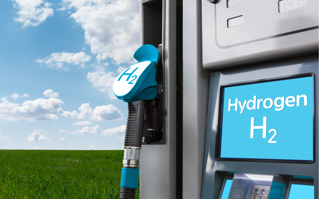 3D illustration of a petrol tank with a hydrogen symbol on it standing in a green field against a blue sky with clouds.